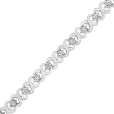 Dress up your everyday look with this classic infinity link diamond tennis bracelet. This piece is crafted from .925 sterling silver, a metal that will stay tarnish free for years to come. Boasting a design of silver "X" links, a miracle-plated round-cut diamond is brilliantly embellished between each link for added glamour. The bracelet has a total carat weight of 1/3 c.t., making it the perfect addition to your growing jewelry collection! Silver Infinity Diamond Bracelet For Formal Occasions, Silver Infinity Diamond Bracelet For Anniversary, Classic Infinity Bracelets For Anniversary, Silver Infinity Bracelets With Diamond Accents, Classic Tennis Bracelet For Anniversary, Infinity Diamond Bracelet With Accents For Anniversary, Anniversary Diamond Bracelet With Infinity Design, Formal White Gold Infinity Diamond Bracelet, Infinity Diamond Bracelet For Anniversary