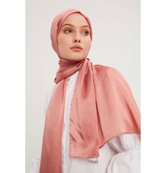 Shine Hijab Shawl - Salmon Glossy in texture and elegant in appearance, our shine shawl is set to be the next great addition to your wardrobe! Its sleek shine makes for an impressive final touch to formal wear so you could look and feel your best on any special occasion. FEATURES: - Glossy finish - Suitable for all seasons - Opaque (not transparent) MATERIAL: - 75 cm x 185 cm - Polyester CARE: - Hand wash separately in cold water. - Lay flat to dry. - Iron on low without steam. Made in Turkey Elegant Formal Shawl For Festive Occasions, Elegant Formal Festive Shawl, Elegant Shawl For Eid And Formal Occasions, Elegant Shawl For Formal Eid Occasions, Elegant Formal Shawl For Eid, Elegant Festive Shawl For Formal Occasions, Fitted Elegant Shawl For Festive Occasions, Elegant Scarves For Formal Festive Occasion, Elegant Formal Scarves For Festive Occasions