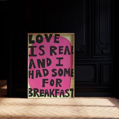 a pink sign that says love its real and i had some for breakfast