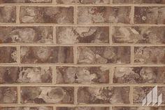 an old brick wall is shown in this image