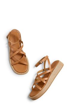 Woven trim highlights the earthy platform sole of this strappy, vacation-ready sandal. Adjustable ankle strap with buckle closure; hidden elastic inset Leather upper and lining/rubber and synthetic sole Imported Leather Sandals With Woven Sole And Ankle Strap, Leather Ankle Strap Sandals With Woven Sole, Summer Sandals With Ankle Strap, Strappy Sandals With Removable Insole For Vacation, Leather Wedge Sandals With Ankle Strap For Vacation, Natural Color Platform Sandals With Ankle Strap, Vacation Strappy Slingback Sandals With Removable Insole, Natural Ankle Strap Platform Sandals, Summer Strappy Platform Sandals