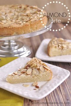 almond torte on a white plate next to a yellow napkin