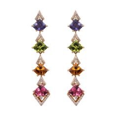 The colorful Confetti Veil earrings are chic and fun earrings with an intricate design and an out-of-the-box attitude. These flamboyant and colorful earrings can complement almost any attire, especially monochromes that need a pop of color. This is the perfect gift for the person in your life who wants more out of life. Luxury Multicolor Drop Earrings, Luxury Multicolor Earrings For Evening, Elegant Multicolor Earrings For Formal Occasions, Luxury Multicolor Earrings For Formal Occasion, Elegant Multicolor Earrings For Evening, Elegant Multi-stone Earrings For Party, Elegant Multicolor Multi-stone Earrings, Formal Multicolor Gemstone Earrings, Multicolor Dangle Earrings For Formal Occasions