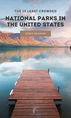 a wooden dock on the water with mountains in the background and text that reads, the 13 least crowded national parks in the united states