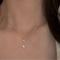 Dainty Water-Drop Pendant Necklace Shiny Inlaid Zircon Necklace Minimalist 14k Plated Clavicle Chain Plating: 14k Gold Plated Main Materia: Alloy Style: Japan, South Korea & French Style Occasion: Daily & Party Occasion Dainty 14k Gold Drop Necklace With Clavicle Chain, Dainty Rose Gold Drop Necklace, Dainty Drop Necklace For Anniversary, Dainty Rose Gold Drop Necklace With Clavicle Chain, Dainty Rose Gold Teardrop Pendant Drop Necklace, Fancy Jewelry Necklace, Zircon Necklace, Drop Pendant Necklace, Necklace Minimalist