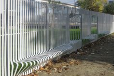 a white fence with wavy lines on it