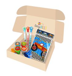 an open cardboard box with toys in it on a white background, including pens and magnets