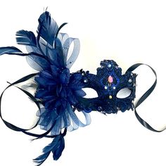 masquerade masks in blue. Simplistic for woman with a navy blue floral- destined to pop out at any event, wedding etc This masquerade mask is great for any occasion. Royal Blue Masquerade Mask, Navy Blue Masquerade Mask, Adjustable Masquerade Mask For Wedding Carnival, Adjustable Blue Costume Accessories For Costume Party, Blue Costume Accessories For Carnival Party, Blue Costume Accessories For Carnival, Elegant Blue Masquerade Mask For Parties, Blue Masquerade Mask For Halloween Costume Party, Elegant Mask For Carnival