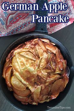 an apple pancake in a cast iron skillet with text overlay that reads, german apple pancake