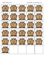 an owl themed alphabet game with letters and numbers