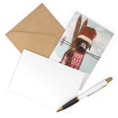 a card with a dog wearing a knitted hat and holding a pair of skis