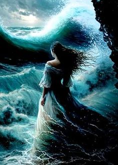 a woman standing on top of a wave in the ocean with her hair blowing in the wind