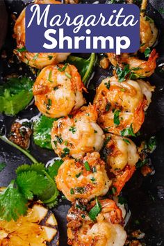 shrimp skewers with cilantro and parsley garnish on top