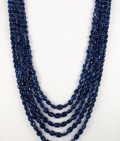 "Adjustable Blue Sapphire oval necklace - multi strand 5 layer smooth bead 6x8 7x9mm jewelry Beaded Necklaces Adjustable Sapphire Necklace Product Details : Name : BLUE SAPPHIRE BEADED NECKLACE Gemstone Name : BLUE SAPPHIRE Chain Style : BEADED Beads Shape : FACETED Oval Beads Size : 6x8 / 7x9 mm Approx. Length : 16\"-18\" Inch Approx. Weight : 570 Cts. Customization : **Available** Please Feel Free To Contact If You Have Any Query." Cheap Blue Beaded Necklaces With Large Beads, Luxury Blue Necklace With Spacer Beads, Luxury Blue Oval Beads Jewelry, Cheap Blue Beaded Necklace With Black Beads, Luxury Blue Beaded Necklace With Large Beads, Luxury Blue Beaded Necklaces With Large Beads, Luxury Blue Necklace With 8mm Beads, Luxury Blue Beaded Necklace With Silver Beads, Luxury Blue Beaded Long Necklace