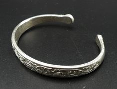 "Vintage silver tone Chinese style cuff, In good vintage condition. Measures 2\" ¾ x 2\" ¼ ( out side edge to edge ). 2\" 5/8 x 2\" ( In side edge ) and 8 mm thick. Thanks." Silver Etched Cuff Bracelet, Adjustable Etched Silver Cuff Bracelet, Adjustable Silver Etched Cuff Bracelet, Etched Silver Cuff Bracelet, Silver Etched Metal Cuff Bracelet, Adjustable Stamped Antique Silver Cuff Bracelet, Etched Silver Metal Cuff Bracelet, Formal Etched Silver Cuff Bracelet, Formal Silver Etched Cuff Bracelet