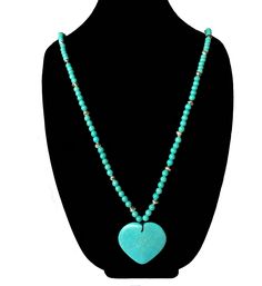 This gorgeous handmade turquoise heart pendant necklace has streaks with a crackle look, howlite beads, and silver metal nugget beads that create a fun and unique necklace! The pendant is suspended from a stiffened cord and closes with a lobster claw clasp and has a 7.5cm/3in extension chain. This is one of a kind and you will get the exact pendant/necklace pictured. ●One Of A Kind● Great to wear or a great gift or a fun stocking stuffer.  ❤ SIZE:  Approx measurements: Length: 94cm/34ins with an Natural Stones Heart Pendant For Jewelry Making, Howlite Round Beads Jewelry Gift, Turquoise Heart-shaped Gemstone Bead Jewelry, Silver Heart Jewelry With Gemstone Beads, Silver Heart-shaped Gemstone Beads Jewelry, Silver Heart-shaped Jewelry With Gemstone Beads, Howlite Gemstone Beads Jewelry For Gifts, Howlite Gemstone Beads Jewelry As A Gift, Turquoise Beaded Heart Pendant Jewelry