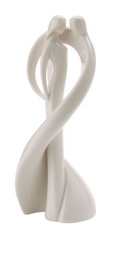 a white vase with a twisted design on it