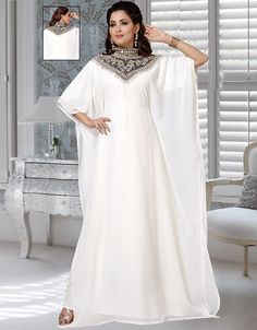 White Boat Neck Georgette Party Wear Farasha Kaftan Heavy Embroidery On Neck Back close with loop, button & zip, easy to wear If You want same Design in different color then Email us after Placing the Order Hijab and band shown in the image can be bought separately Fabric: GeorgetteCare: Mild machine wash/ hand Cold Wash/ Dry cleanWe request customers to carefully choose the correct size and dress length referring to our size chart White Embroidered Kaftan For Party, White Abaya For Festive Occasions, White Kaftan For Eid Party, Festive White Embellished Abaya, White Embellished Kaftan For Party, Festive White Abaya For Eid, Kaftan Style Kurti, Designer Kaftan, White Kurti