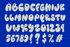 the upper and lower letters are white on a blue background, with numbers below them