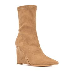 The Odette bootie is faux suede design featuring a pointed toe wedge and side zipper closure. This style is perfect for work, dinner or a date.Closure Type: Side ZipperShaft Circumference: 11 1/4 InchesBoot Shaft Height: 7 InchesShoe Heel Height: 3 3/4 InchesUpper/Outer Base Material: 100% TextileShoe Lining Material: FabricSole Material Content: 100% Thermoplastic-RubberCalf Width: RegularToe Type: Pointed Toe, Closed ToeHeel Style: Wedge HeelCountry of Origin: Imported Heeled Chelsea Boots, Chelsea Rain Boots, Target Clothes, Closed Toe Shoes, Shoes Boots Ankle, Wedge Ankle Boots, New York And Company, Shoes Heels Wedges, Womens Wedges