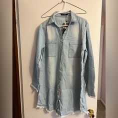 Soft Denim Tunic Length Distressed Shirt. Never Worn. Tags Attached Trendy Denim Shirt For Day Out, Cotton Denim Top With Frayed Hem, Long Sleeve Washed Blue Denim Top With Frayed Hem, Washed Blue Long Sleeve Denim Top With Frayed Hem, Casual Long Sleeve Denim Top With Frayed Hem, Blue Long Sleeve Denim Top With Frayed Hem, Casual Distressed Denim Dress, Casual Denim Shirt For Day Out, Light Wash Chambray Denim Top With Long Sleeves