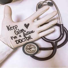 a doctor's glove with the words keep calm i'm a future doctor written on it