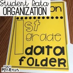 a yellow and black sign that says student data organization on the side of a table