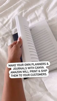 a person holding an open book with the text make your own planners & journals with canvass