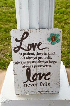 a sign that says love is patient, love is kind