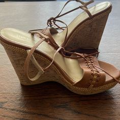 New , With No Tags, Unused, But Has Some Mark Size 8.5, Stuart Weitzman Napa Leather Sandal. 4.8" Cork Wedge Heel. 1" Platform; 3.8" Equiv. Woven Toe Strap. Crisscross Ankle-Wrap. Self-Tie Closure. "Tiedover" Is Made In Spain. Brown Ankle Tie Sandals With Wrapped Heel, Elegant Brown Wedge Sandals For Spring, Brown Leather Sandals With Ankle Tie, Brown Leather Ankle Tie Sandals, Vacation Brown Wedge Sandals With Wrapped Heel, Brown Ankle Strap Wedge Sandals With Wrapped Heel, Elegant Brown Wedge Sandals For Vacation, Brown Wrapped Heel Lace-up Sandals, Brown Wedge Sandals With Wrapped Heel For Spring