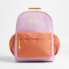 A backpack that's extra comfy and ready to handle all the adventures of the day. Combining colorblocks of purple and orange with pops of yellow trim, the kids' large knapsack is constructed of supremely durable polyester fabric that includes recycled plastic bottles. A roomy interior holds everything your kid needs-books, school supplies, extra layers-and there's a padded pocket to keep their tablet protected. Outside pockets hold snacks, water bottles and more. Pair this book bag with the match Playful Nylon School Bag, Back To School Color Block Standard Backpack, Playful Purple Backpack For Everyday Use, Functional Orange Backpack For School, Orange Nylon School Bags, Purple Backpack For Playtime And Back To School, Purple Nylon Sporty Backpack, Sporty Purple Nylon Backpack, Purple Backpack For End Of School Year