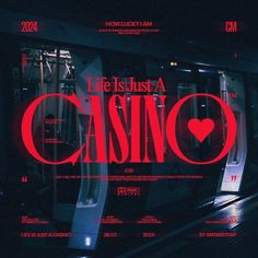 the words life is just a casino are displayed in front of a window with red lettering