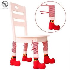 a white chair with red socks and boots on it