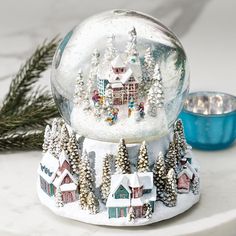 a snow globe sitting on top of a table