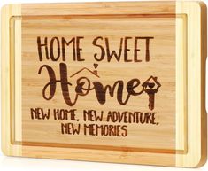 a wooden cutting board with the words home sweet homes written in brown ink on it