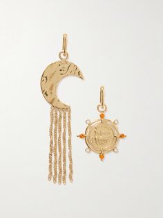 Rabanne's earrings are purposely mismatched to depict the sun and the moon. Handmade from gold-tone metal, they have an oval hoop shape with a crystal-detailed coin charm suspended from one and strands of delicate chains hanging from the other. Wear yours day or night. Yellow Gold-plated Moon Charm Earrings, Gold Symbolic Moon Charm Earrings, Gold Symbolic Earrings With Moon Charm, Symbolic Gold Earrings With Moon Charm, Gold Plated Yellow Gold Earrings With Moon Charm, Yellow Gold Drop Earrings With Moon Charm, Yellow Gold Plated Earrings With Moon Charm, Yellow Gold Moon Charm Drop Earrings, Yellow Gold Dangle Coin Pendant Jewelry