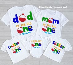 three matching shirts with the words dad, mom, and son in different colors on them