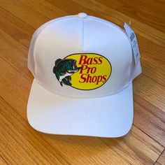 Nwt Bass Pro Shop Trucker Hat Color- White Adjustable Cap Stay On Trend With This Original Bass Pro Shops Cap! Original Price Includes The Required (Comparable) Shipping To Get This Hat Shipped From Your Nearest Bass Pro Shop To You! I Can Ship Quicker For Less! Check Out Other Colors Available! Bass Pro Shops Hat, Bass Logo, Bass Pro Shop Hat, Bass Pro Shop, Camo Hats, Black Snapback, Mesh Hat, Green Logo, Hats Snapback