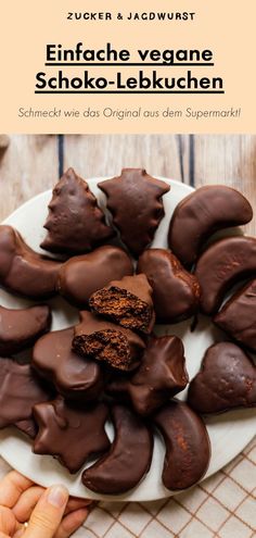 chocolate covered cookies on a white plate with text overlay that reads, enfache vegane schoko - lebkuchen