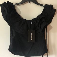 New With Tags Gorgeous Ruffle Can Be Worn On Or Off Shoulders Fitted With Hidden Side Zipper Length From Front Neckline Approx 14” Pit To Pit Approx 17” 3-1 Summer Going Out Crop Tops, Trendy Ruffled Tops For Date Night, Black Tops For Going Out In Spring, Black Ruffled Crop Top For Summer, Casual Ruffled Tops For Night Out, Black Cropped Ruffle Crop Top, Black Ruffled Crop Top, Spring Ruffled Crop Top For Night Out, Ruffled Crop Top For Night Out In Spring