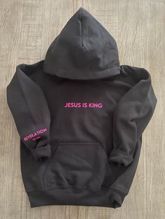 Youth Hoodie 50/50 poly/cotton blend with Jesus is King on front and Revelations 17:14 on right sleeve. Picture is shown in black and neon blue and neon pink. Care instructions - For best results wash inside out in cold water and tumble dry low. Christian Clothing Brand, Jesus Clothes, Jesus Is King, Christian Hoodies, Gildan Hoodie, Cute Preppy Outfits, Cute Sweatshirts, Soft Hoodie, Youth Hoodies