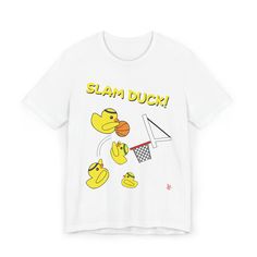 Who would've thought a basketball game between some rubber duckies could get so intense? Definitely some appropriate attire for whenever you're playing basketball. This classic unisex jersey short sleeve tee fits like a well-loved favorite. Soft cotton and quality print make users fall in love with it over and over again. These t-shirts have-ribbed knit collars to bolster shaping. The shoulders are tapered for a better fit over time. Dual side seams hold the garment's shape for longer.  ★ Super Sporty T-shirt With Funny Print For Streetwear, Casual Basketball T-shirt With Screen Print, Graphic Cotton Basketball T-shirt, Cotton Graphic Tee For Basketball, Graphic Cotton T-shirt For Basketball, Pre-shrunk Graphic Tee For Basketball, Fun Graphic Print T-shirt For Sports Events, Graphic Tee For Basketball With Short Sleeves, Rubber Duckies