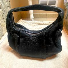 This Is A Gently Used Beautiful Black Pebbled Leather Alexander Wang “Morgan” Hobo Bag. I Bought This Gently Used For Work But It’s Too Big (I Needed A Black Bag). No Obvious Signs Of Wear. It’s Very Roomy And Interior Is Clean. No Odor. See Photos For Size. The Bottom Is Studded, Which Is A Stunning Accent To This Purse. There Are 2 Exterior Zipper Pockets, 1 Interior Zipper Pocket And 2 Interior Slip Pockets. Thank You For Viewing My Items. Pet And Smoke Free Home Black Pebbled Leather Shoulder Bag With Silver-tone Hardware, Pebbled Leather Satchel With Silver-tone Hardware, Black Pebbled Leather Shoulder Bag With Soft Leather, Black Leather Shoulder Bag With Silver-tone Hardware, Black Pebbled Leather Hobo Bag, Daily Use Pebbled Leather Shoulder Bag With Silver-tone Hardware, Black Pebbled Leather Shoulder Bag With Double Handle, Leather Hobo Bag With Silver-tone Hardware, Leather Hobo Shoulder Bag With Silver-tone Hardware