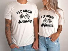 a man and woman wearing matching shirts that say pit crew daddy and mama on them