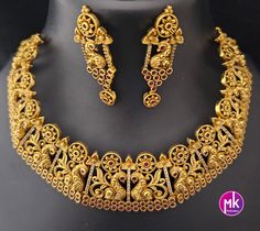 Premium Peacock Traditional matte gold finish big Bridal Necklace with AD Stones with Matching Big Earrings -  MK Fashionkart Material: Premium Matte gold finish, AD stones Earrings: Matching Earrings Suitable for Saree/Salwar/party wear dresses Adjustable length    SHIPPING : Ready to ship in 1 business day. This item will be shipped from The United States. Jewelry care instructions : 1. Please wipe the jewelry with a piece of cotton cloth after usage.  2. Store the jewelry in a cool, dry and air tight box or pouch.  3. Make sure the jewelry is away from direct heat and water. 4. Please wipe of any moisture, sweat, soap water after usage. Gold Sets With Peacock Design For Festive Season, Festive Gold Sets With Peacock Design, Elegant Gold Sets With Peacock Design, Traditional Gold Sets With Peacock Design, Elegant Gold Set With Peacock Design, Diwali Gold Sets With Peacock Design, Earrings Matching, Stones Earrings, Antique Bridal Jewelry