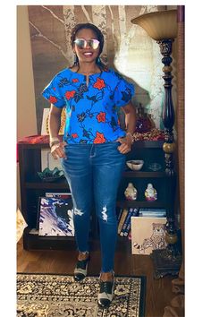 Our new unique Ankara top is made from African fabric 100% cotton. Wear this fun short Ankara top over pants, skirts, shorts, or jeans. Our items will be specially handmade to order in our studio upon ordering.  We are happy to answer questions regarding measurements. Maximum Length: Approximately 22" To shop our longer-length tops click below: https://www.etsy.com/shop/VeesFabDesigns?ref=seller-platform-mcnav&section_id=27870128 Please view the inserted pics for your selections. To purchase, place the item in your cart, and include at least your bust and hip measurements.   For reference, the model is 5'7" and wears a Medium, for a fuller fit you may go up a size. 🛑 Please note some slight color variations due to differences in computer monitors. Measurements Guide: See inserted pictures Blue Non-stretch Short Sleeve Top, Multicolor Non-stretch Cotton Tops, Non-stretch Multicolor Cotton Tops, Stretch Cotton Floral Print Tops, Stretch Cotton Tops With Floral Print, Cotton Stretch Tops For Vacation, Casual Stretch Cotton Blouse, Cotton Stretch Floral Print Blouse, Floral Print Cotton Crop Top