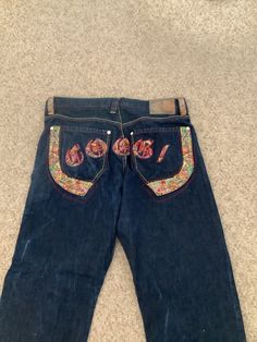 This nice vintage 90's dark denim COOGI rainbow stitched logo on rear back pockets jean comes to you in a retro hip hope style in a marked size 40 x 32. You can see rainbow stitching on zipper area and on belt loops. Hard to find. Such a cool pair of jeans. Evisu Jeans, Streetwear Inspo, Dope Fits, Painted Jeans, Perfect Pant, Blue Rainbow, 2022 Fashion, Dream Shoes, Pocket Jeans