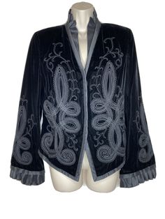 Carmen Marc Valvo Black Velvet Embroidered Ruffled Jacket Sz 12 NEW NWT $525. Condition is New with tags. Shipped with USPS Priority Mail. New with tags. Beautifully embroidered heavy weight well made blazer. ✅ also for sale matching St. John Evening velvet wide leg pants new with tags in size 12. Please message me if you would like them as a set. Measurements: underarm to underarm: 20 inches, length 24.5 inches, sleeves from shoulder seam 26.5 inches, shoulder seam to shoulder seam 15.5 inches. Chic Long Sleeve Embroidered Blazer, Embroidered Evening Blazer For Winter, Embroidered Long Sleeve Evening Blazer, Long Sleeve Embroidered Evening Blazer, Designer Embroidered Blazer For Fall, Embroidered Fitted Evening Outerwear, Fitted Embroidered Evening Outerwear, Embroidered Fitted Outerwear For Evening, Designer Embroidered Evening Outerwear