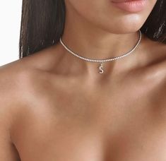 So excited to list our stunning Tennis necklace gifts for her. This popular style is perfect for wedding jewellery and bridesmaid gifts or bridesmaids jewellery. Available in Sterling silver 925 and 18k gold/rose gold plated. Dainty worn alone or stacked with necklace and watches with such high sparkle they will compliment any outfit from day to night. 🤍SIZE AND MATERIALS🤍 925 Sterling Silver With Platinum Plated Classic Square Tennis necklace Chokers - non tarnish necklace 925 sterling silver Personalized Sterling Silver Necklaces For Party, Initial Pendant Jewelry With Clavicle Chain For Anniversary, Anniversary Initial Pendant Jewelry With Clavicle Chain, Silver Initial Pendant Jewelry For Party, Silver Initial Pendant For Party, Silver Initial Pendant Party Jewelry, Elegant Cubic Zirconia Name Necklace, White Gold Clavicle Chain Choker, White Gold Clavicle Chain Choker Necklace