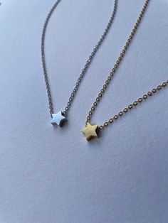 Meaning: No matter what you go through, your shine will never dull. Cute 3D star necklace perfect for everyday wear. All items are handmade and a portion of the profits will go to MIND charity, supporting mental health. This star pendant is rhodium or gold plated stainless steel making it durable and long lasting, supported on a silver or gold plated brass chain that is lightweight and comfortable. Minimalist Star Necklace For Everyday, Minimalist Star Necklace With Adjustable Chain, Everyday Star Necklace With Adjustable Chain, Minimalist Star Shaped Clavicle Chain Necklace, Tiny Star-shaped Jewelry Gift, Minimalist Star Charm Necklace As Gift, Minimalist Star Charm Necklaces For Gift, Minimalist Star Charm Necklace Gift, Minimalist Star Charm Necklace For Gift